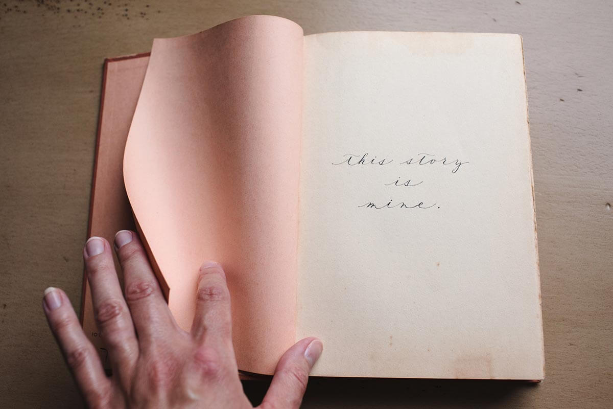 Handwritten journal reading "this story is mine".